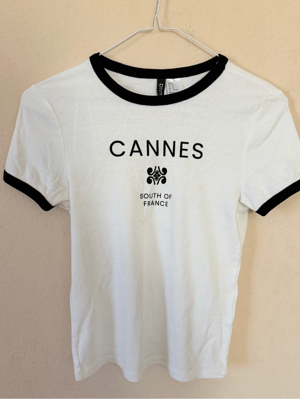 H&M White Ringer Tee with Black Trim and 'CANNES' Print